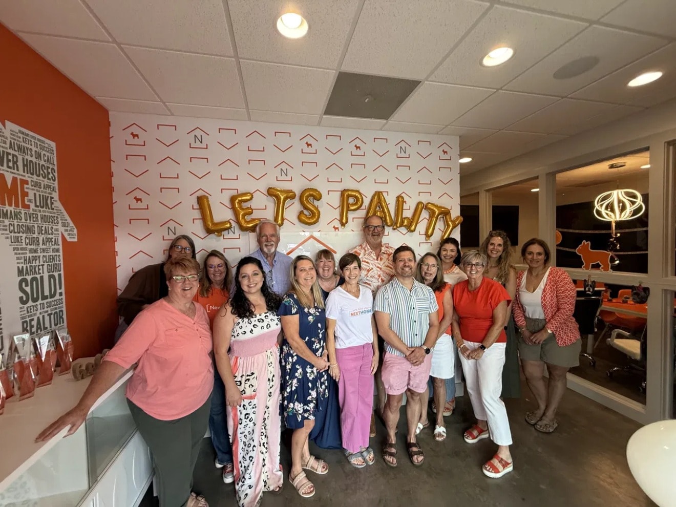 NextHome Paramount team celebrating inside the office